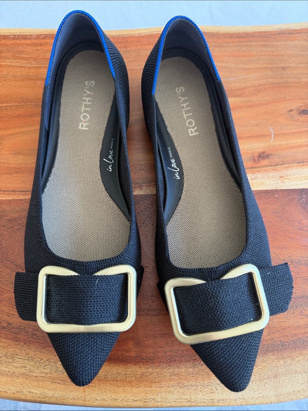 Rothy's Black Pointed Flat with Gold Buckle Accent and Blue Trim